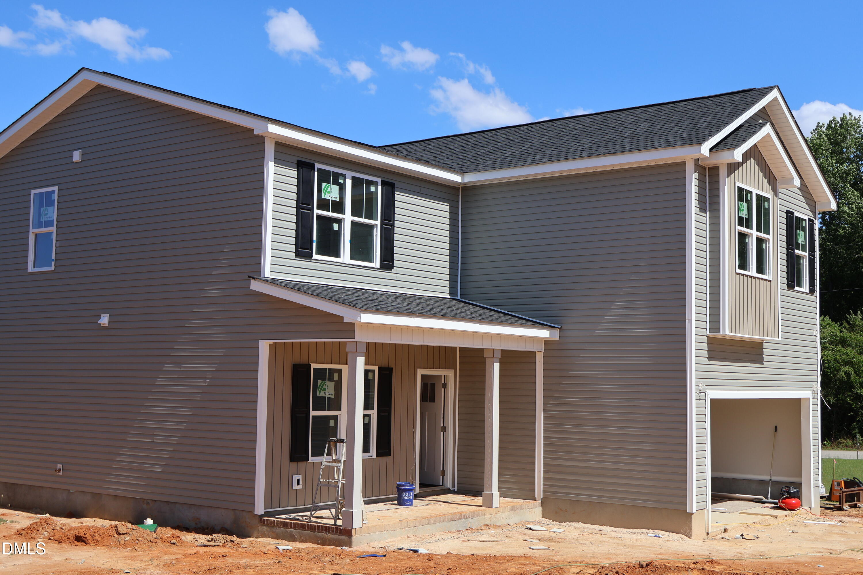 125 Wilson Street Erwin, NC 28339 - Photo 7 of 22 a front view of a house with a yard