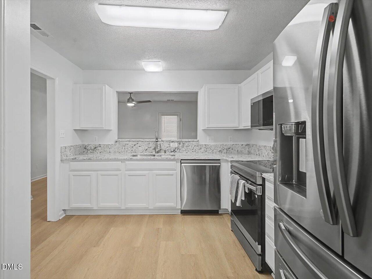 4805 Tanglewood Oaks Street Raleigh, NC 27610 - Photo 11 of 59 11-Kitchen