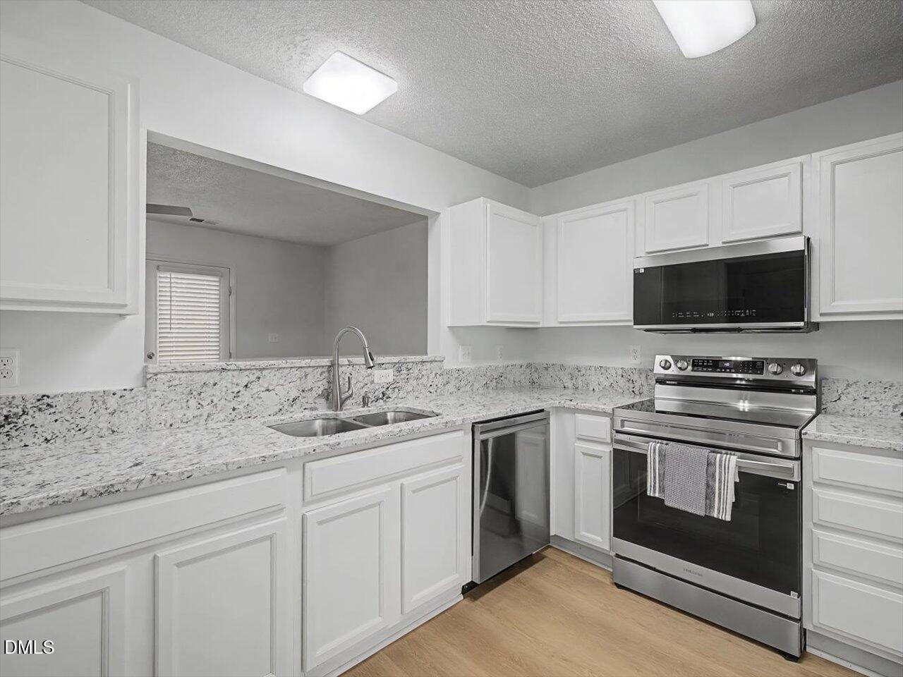 4805 Tanglewood Oaks Street Raleigh, NC 27610 - Photo 12 of 59 12-Kitchen