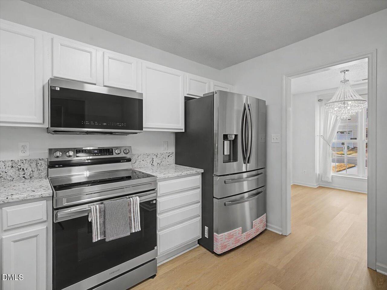 4805 Tanglewood Oaks Street Raleigh, NC 27610 - Photo 13 of 59 13-Kitchen