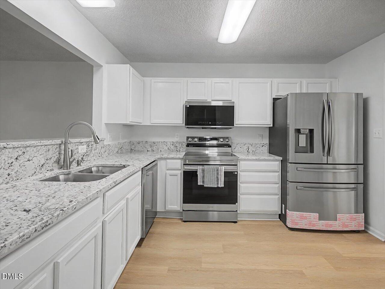 4805 Tanglewood Oaks Street Raleigh, NC 27610 - Photo 16 of 59 16-Kitchen