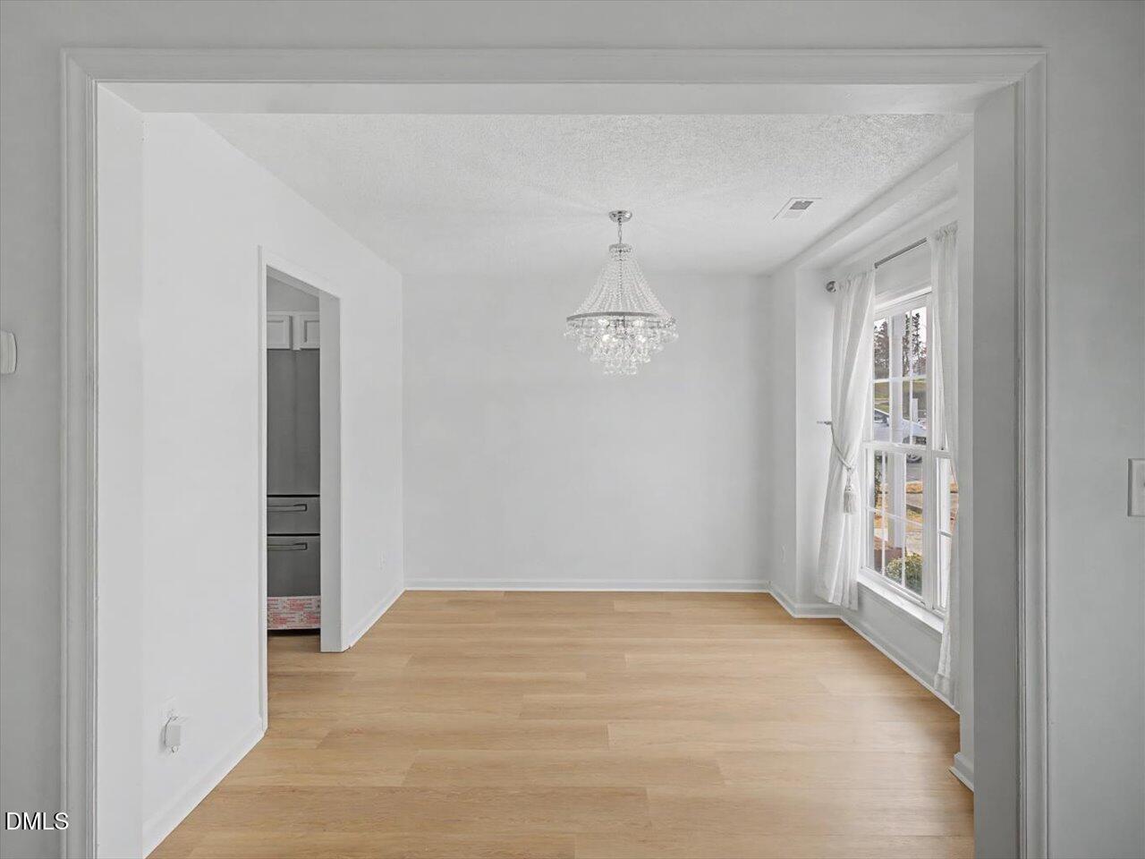 4805 Tanglewood Oaks Street Raleigh, NC 27610 - Photo 7 of 59 07-Dining Room