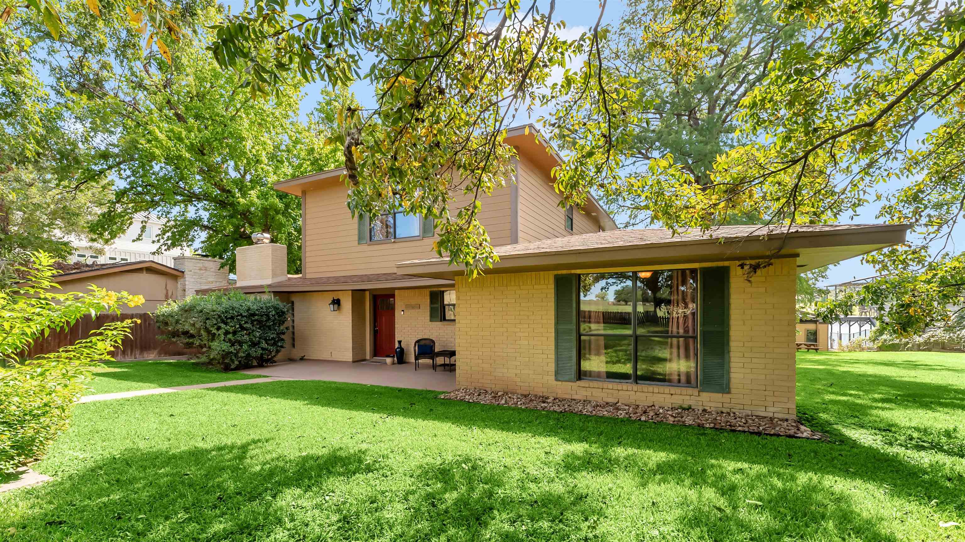 539 Ellen Williams Loop Kingsland, TX 78639 - Photo 5 of 30 front view of a house with a yard