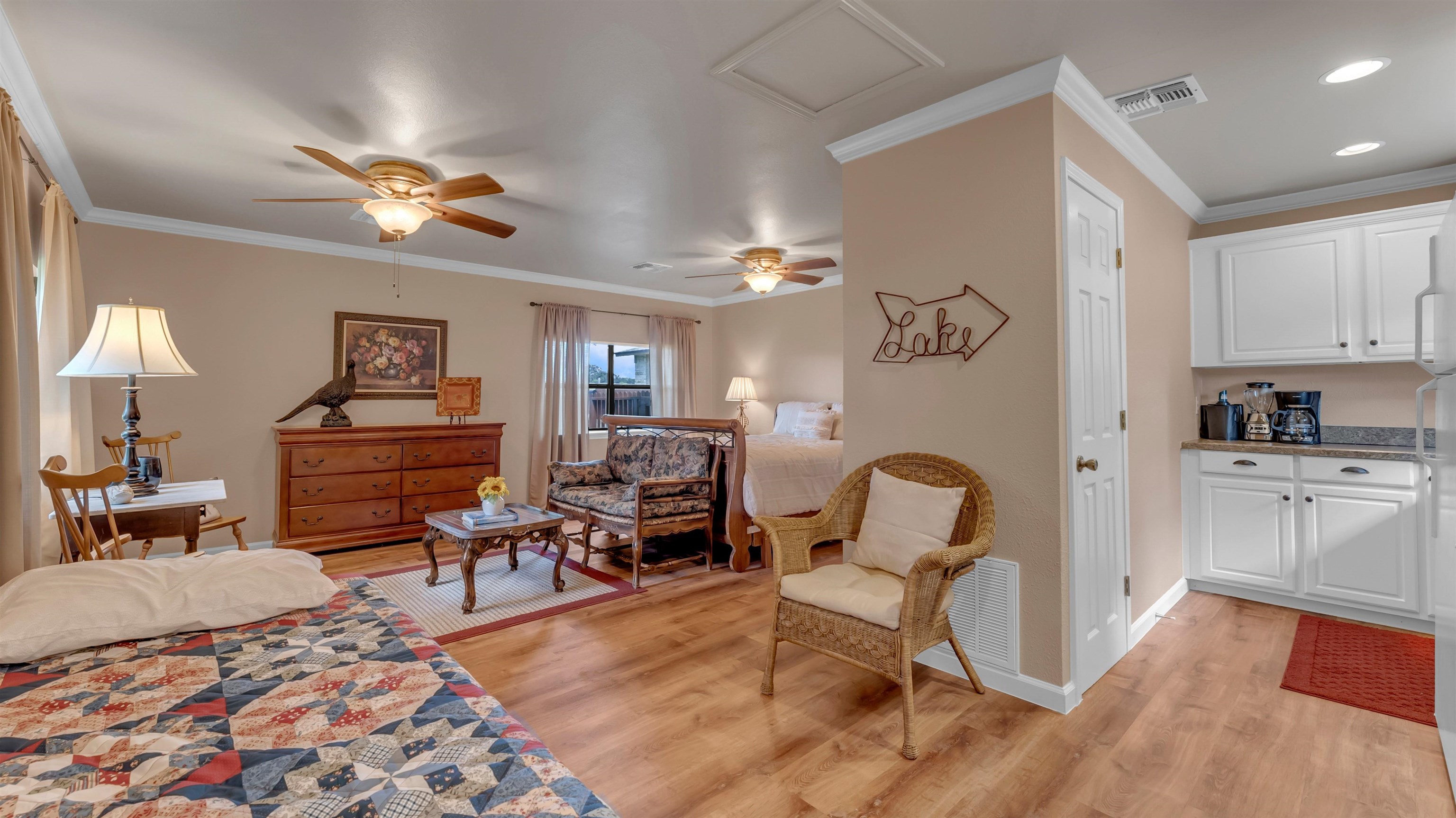 539 Ellen Williams Loop Kingsland, TX 78639 - Photo 8 of 30 a bedroom with furniture and a rug