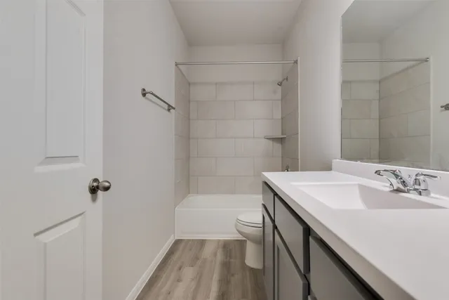 a bathroom with a sink a bathtub and a shower