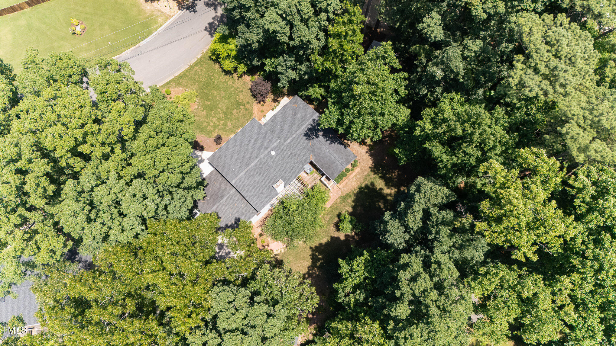 6609 Electra Drive Raleigh, NC 27607 - Photo 35 of 35 an aerial view of a house with a yard and swimming pool