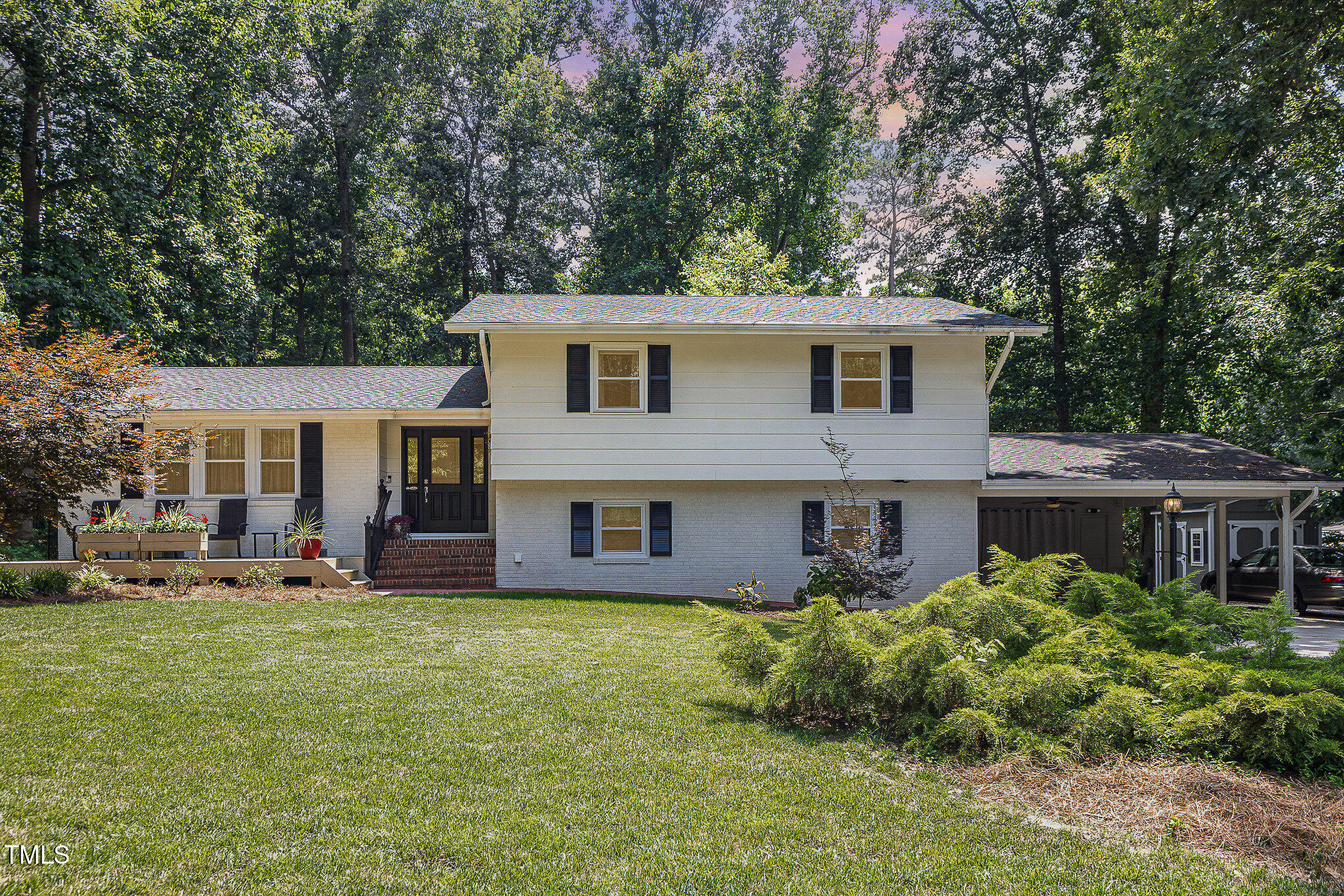 6609 Electra Drive Raleigh, NC 27607 - Photo 4 of 35 a front view of house with yard and green space