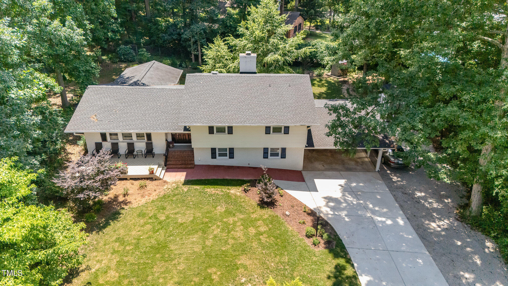 6609 Electra Drive Raleigh, NC 27607 - Photo 5 of 35 a view of a house with swimming pool and sitting area