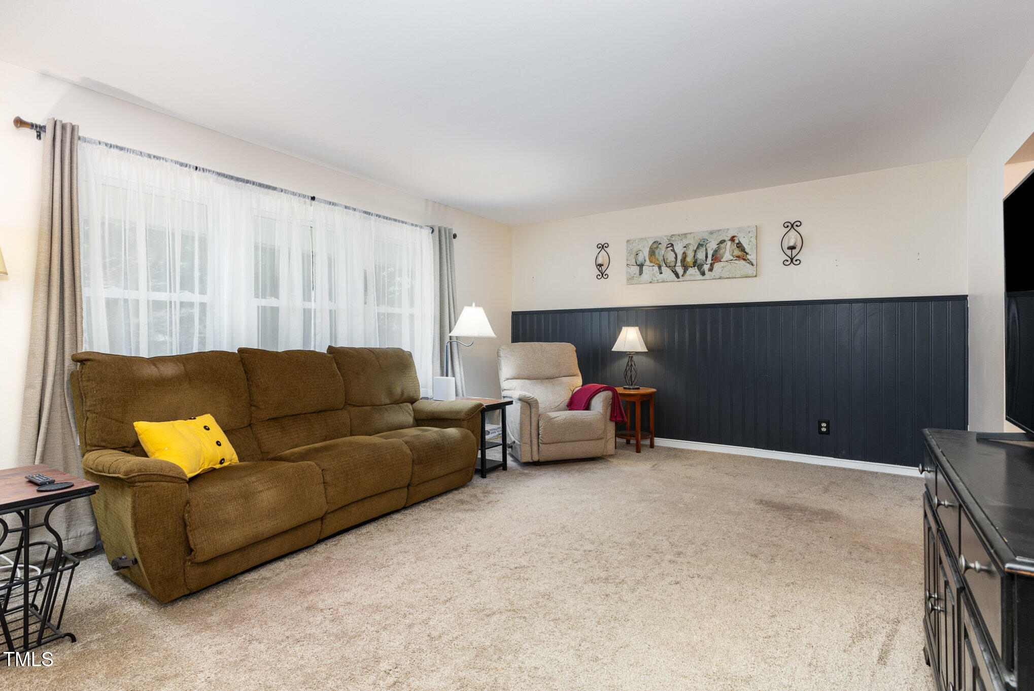 6609 Electra Drive Raleigh, NC 27607 - Photo 10 of 35 a living room with furniture and a couch
