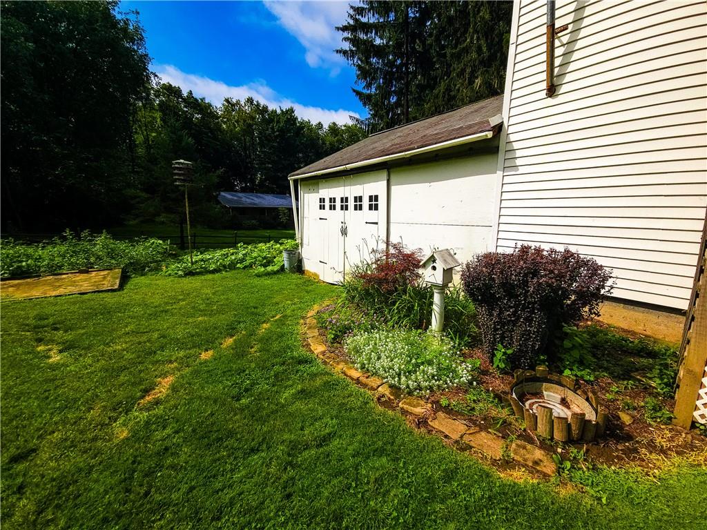 496 Great Belt Road Butler, PA 16002 - Photo 27 of 33 a view of a back yard of the house