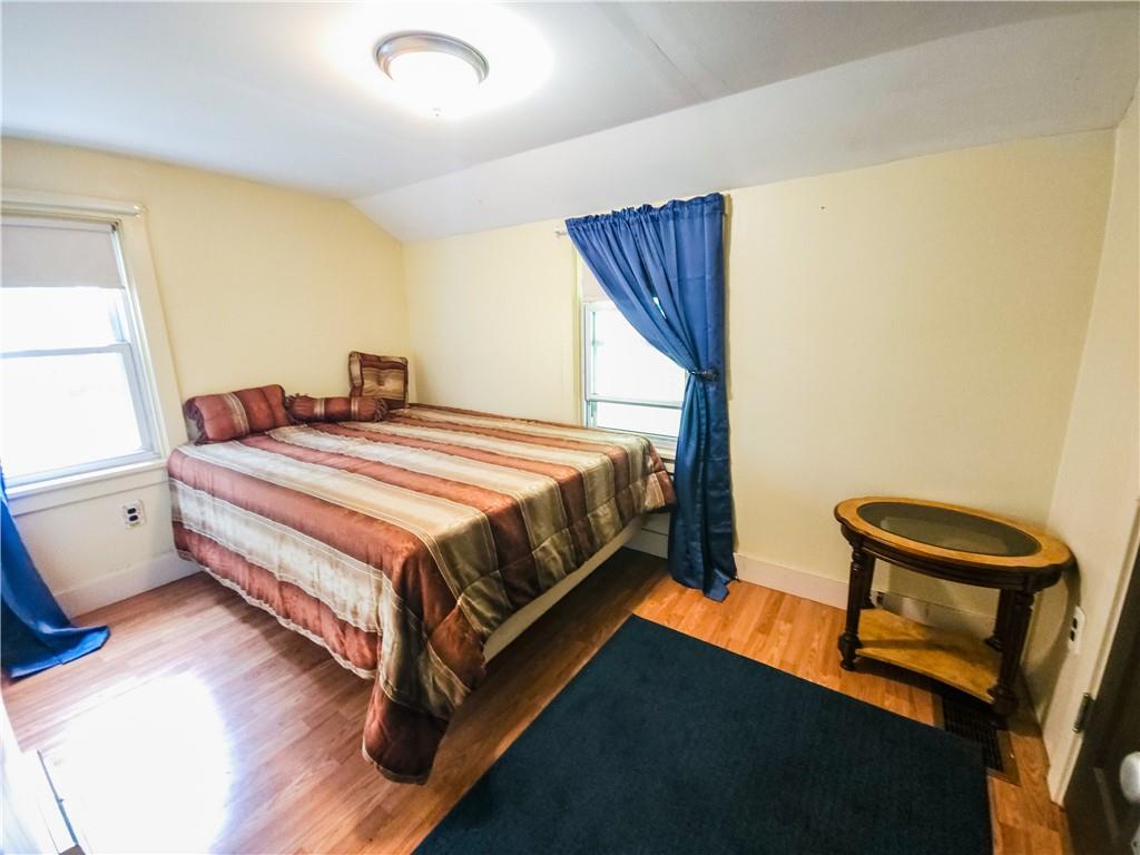 496 Great Belt Road Butler, PA 16002 - Photo 32 of 33 a bedroom with a bed chair and window