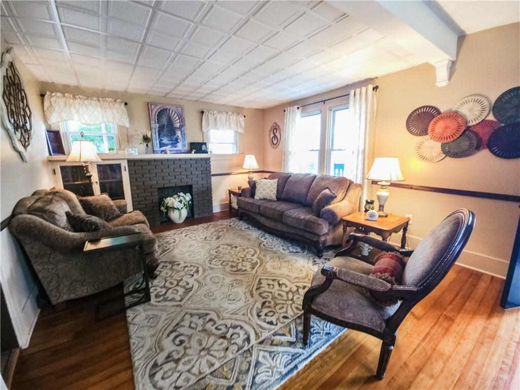 496 Great Belt Road Butler, PA 16002 - Photo 8 of 33 a living room with furniture and a fireplace
