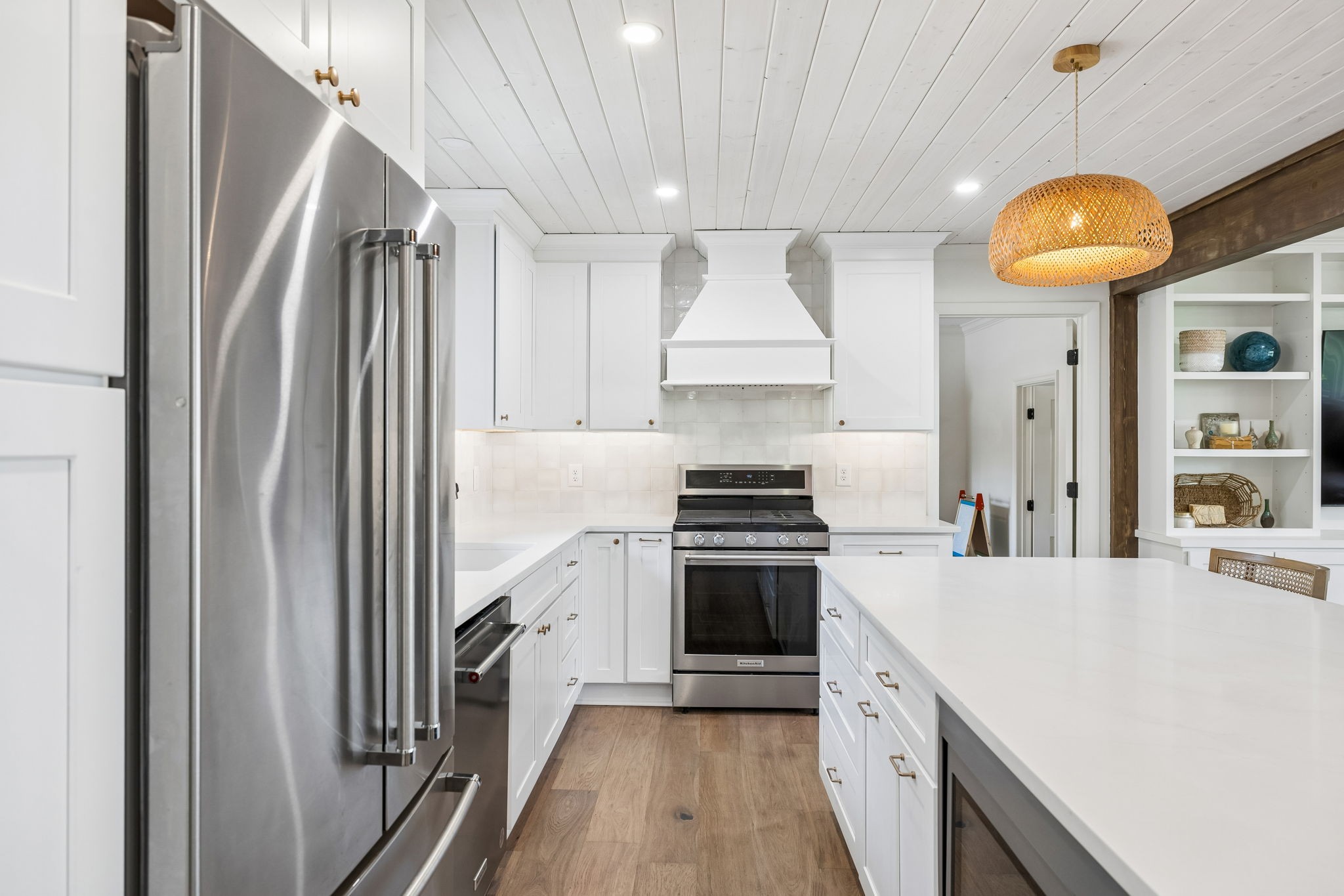 383 Blackman Road Nashville, TN 37211 - Photo 18 of 71 a kitchen with stainless steel appliances a stove a chimney a sink and cabinets