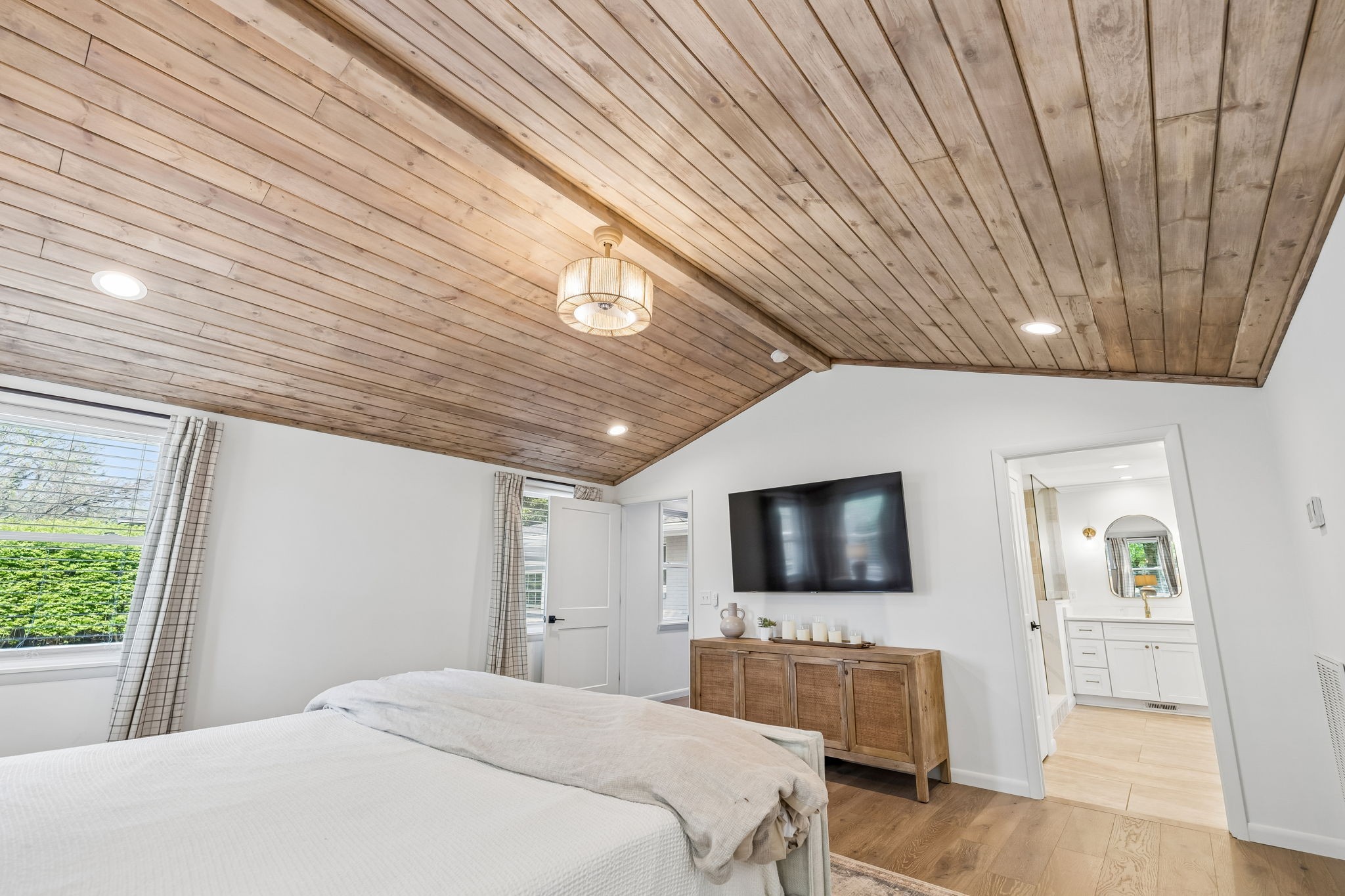 383 Blackman Road Nashville, TN 37211 - Photo 25 of 71 a bedroom with a bed and flat screen tv