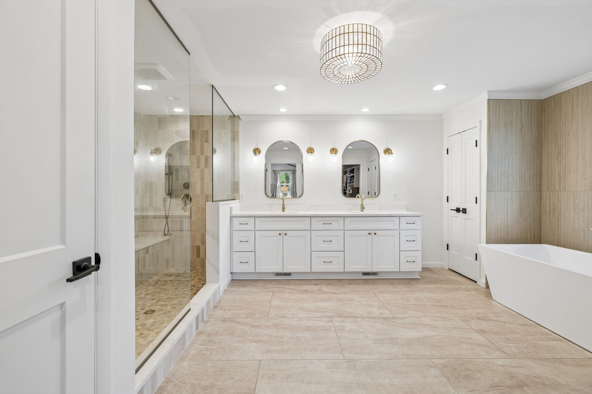 383 Blackman Road Nashville, TN 37211 - Photo 27 of 71 a spacious bathroom with a double vanity sink a large mirror and shower