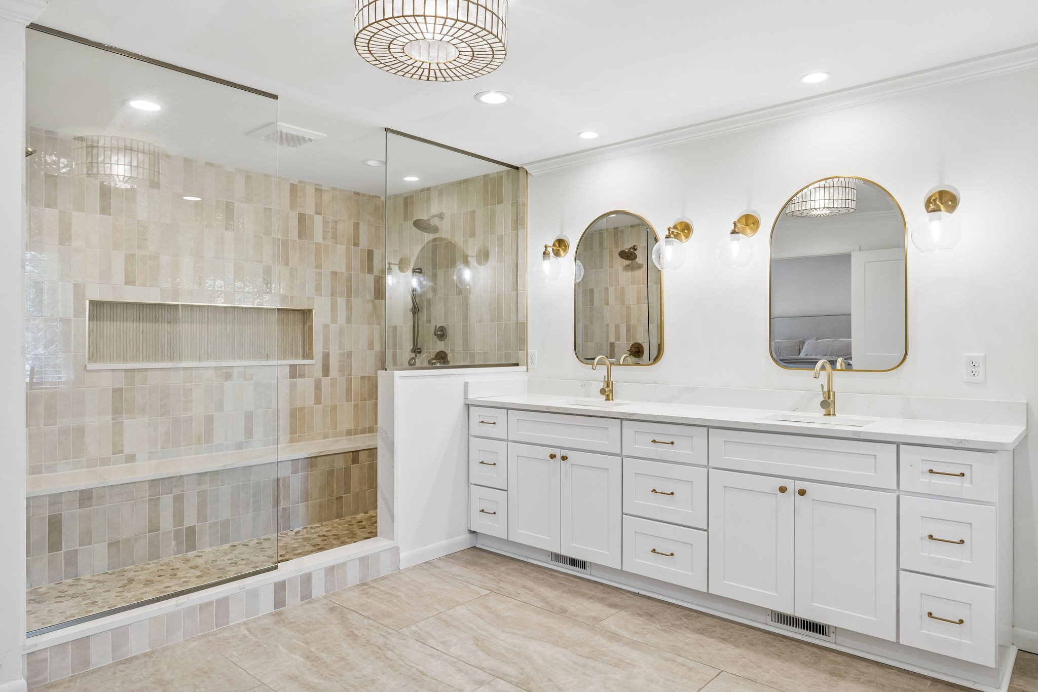 383 Blackman Road Nashville, TN 37211 - Photo 29 of 71 a bathroom with double vanity sinks a mirror a glass door and vanity