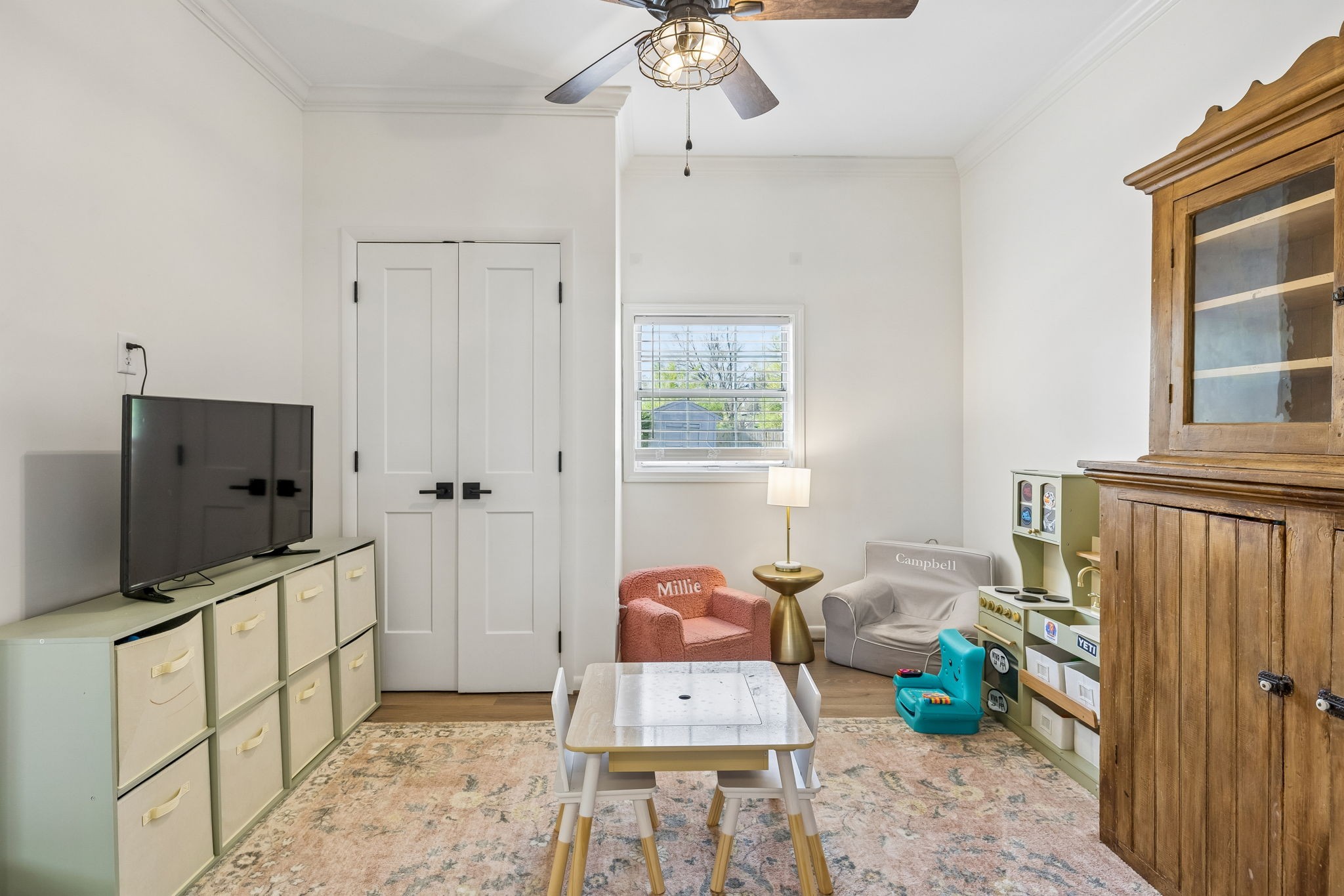 383 Blackman Road Nashville, TN 37211 - Photo 33 of 71 a living room with furniture and a flat screen tv