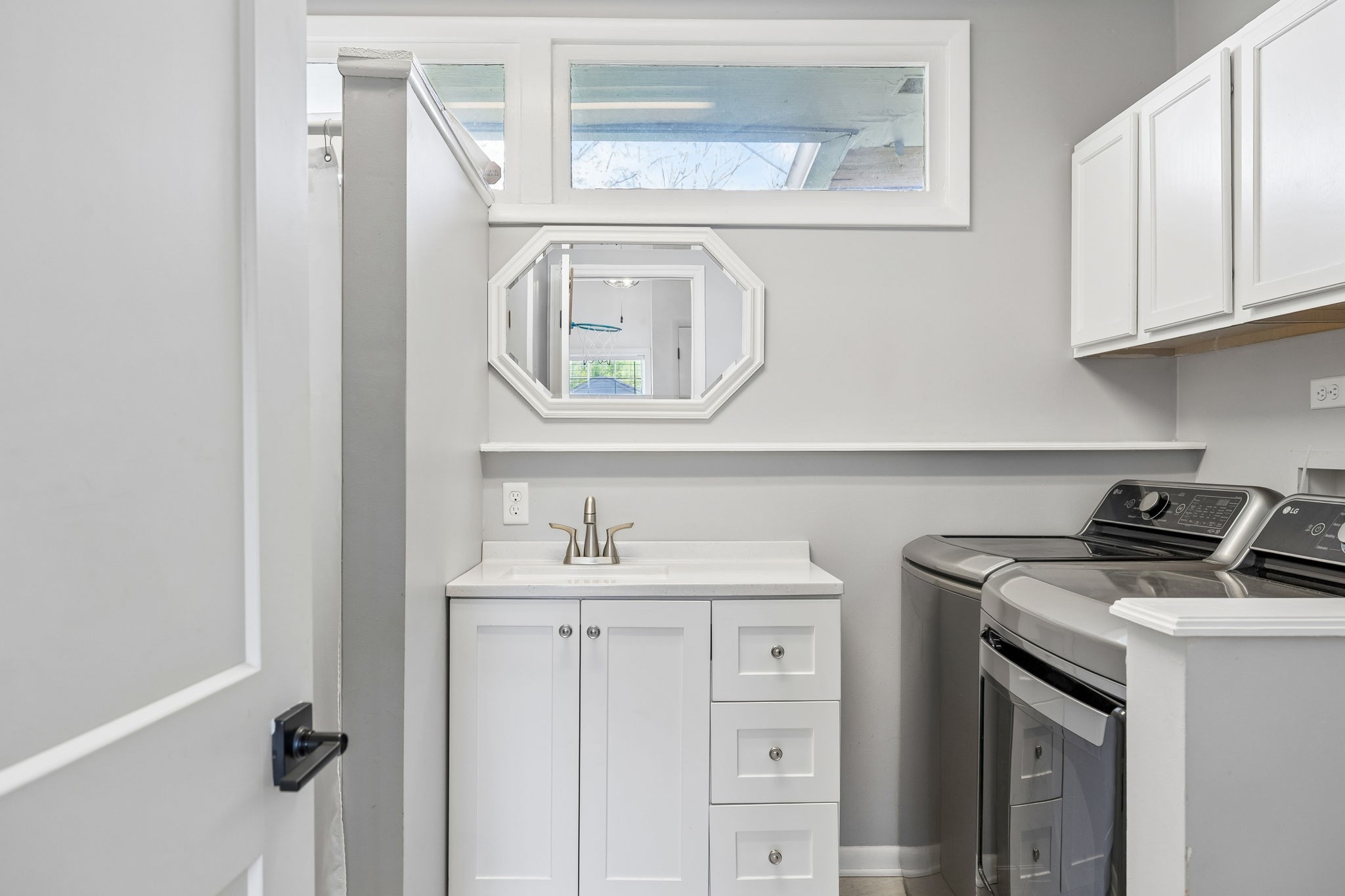 383 Blackman Road Nashville, TN 37211 - Photo 36 of 71 a kitchen with stainless steel appliances granite countertop a sink and a stove next to a white cabinet