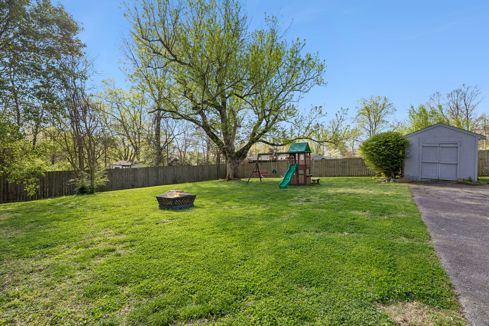 383 Blackman Road Nashville, TN 37211 - Photo 50 of 71 a view of a backyard with a garden