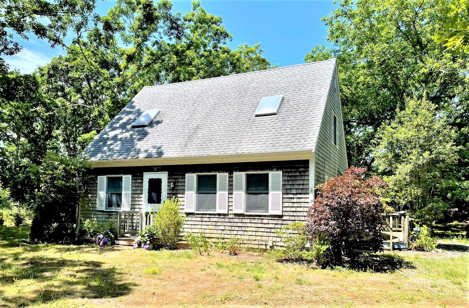 8 Boylston Drive Edgartown, MA 02539 - Photo 1 of 17 a front view of a house with a yard