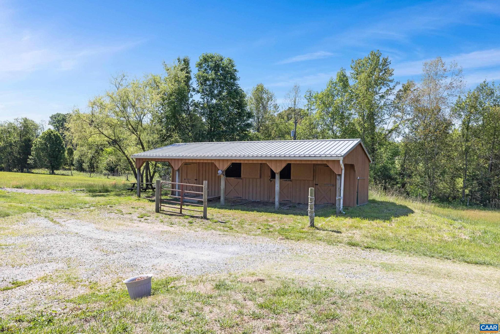 1075 Social Hall Road New Canton, VA 23123 - Photo 19 of 64 a view of a house with backyard and trees