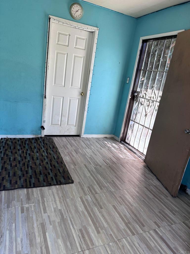 3333 Delta Avenue Long Beach, CA 90810 - Photo 15 of 31 a view of a room with wooden staircase