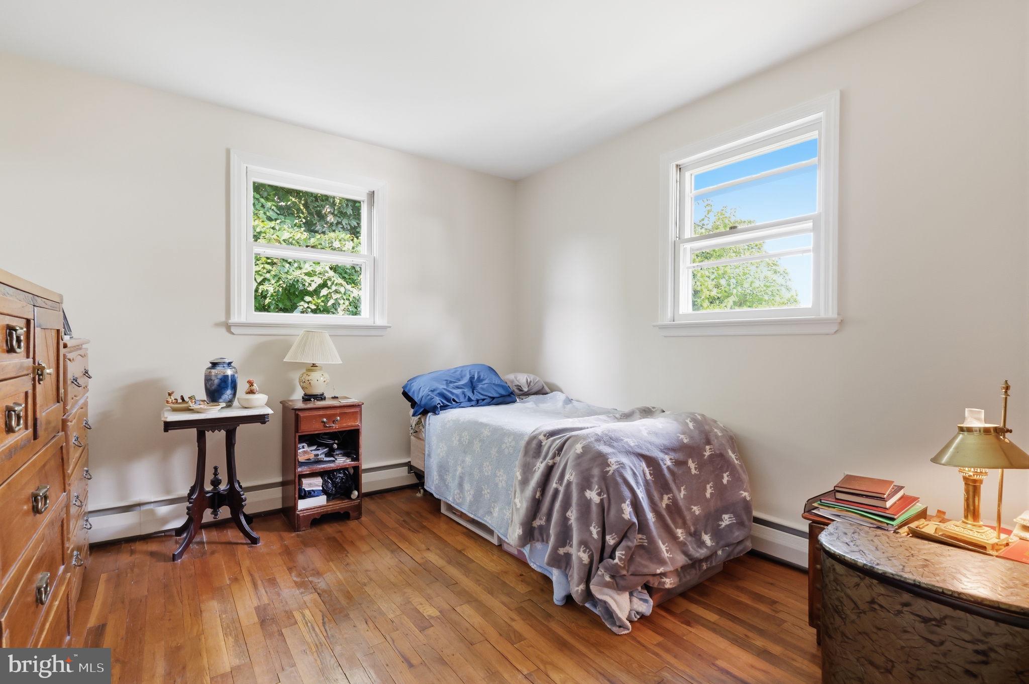 1413 Poplar Road Feasterville-Trevose, PA 19053 - Photo 15 of 35 a room with a bed and a window