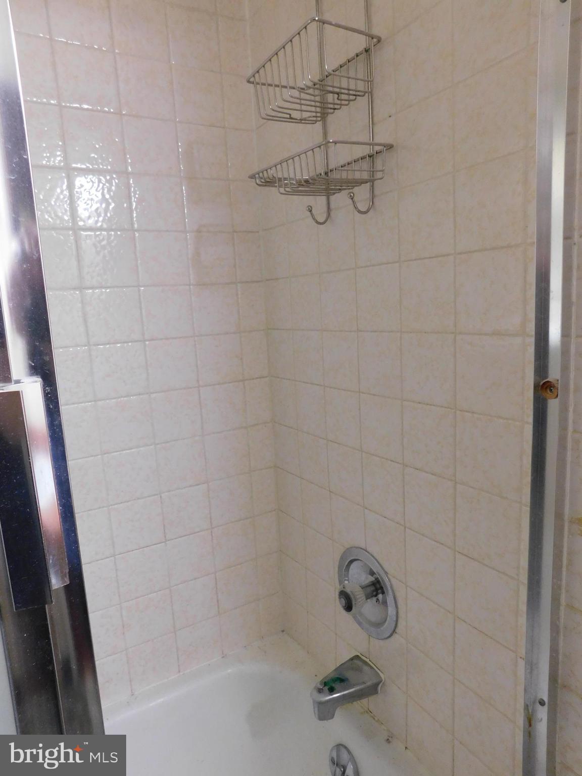 8504 Oakleigh Road Baltimore, MD 21234 - Photo 14 of 35 a bathroom with a shower