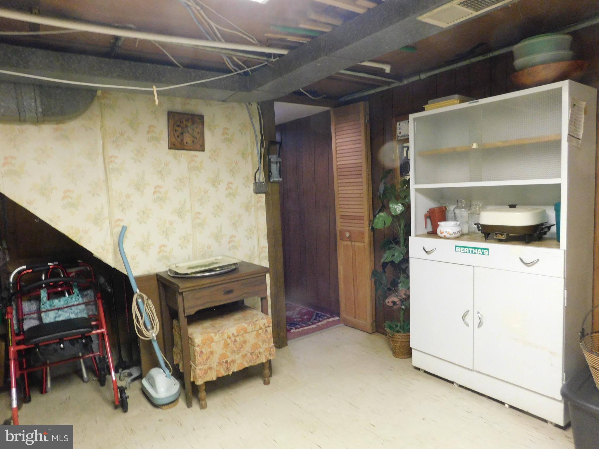 8504 Oakleigh Road Baltimore, MD 21234 - Photo 23 of 35 a room with storage and utility