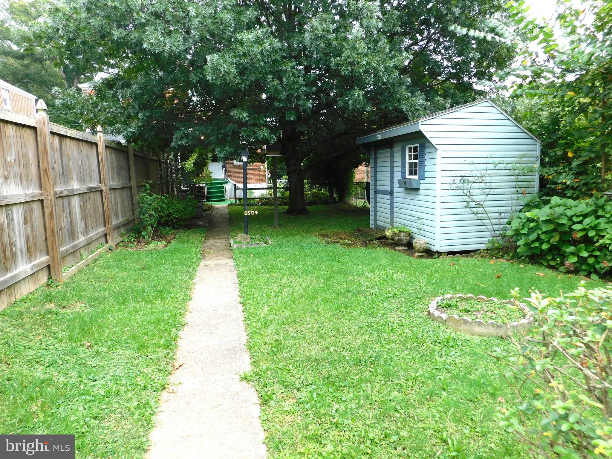 8504 Oakleigh Road Baltimore, MD 21234 - Photo 32 of 35 front view of a house with a yard