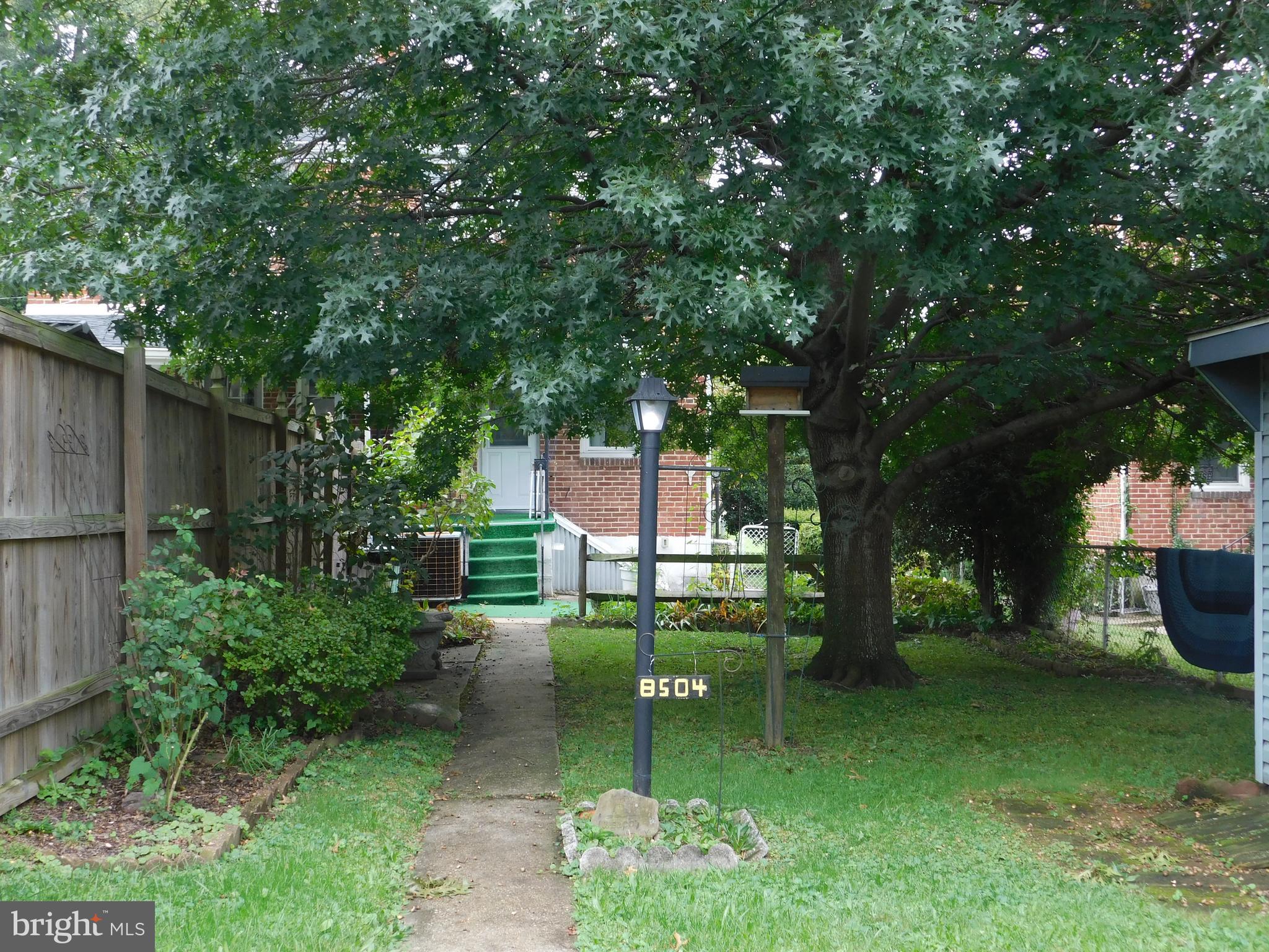 8504 Oakleigh Road Baltimore, MD 21234 - Photo 33 of 35 a garden view with a seating space