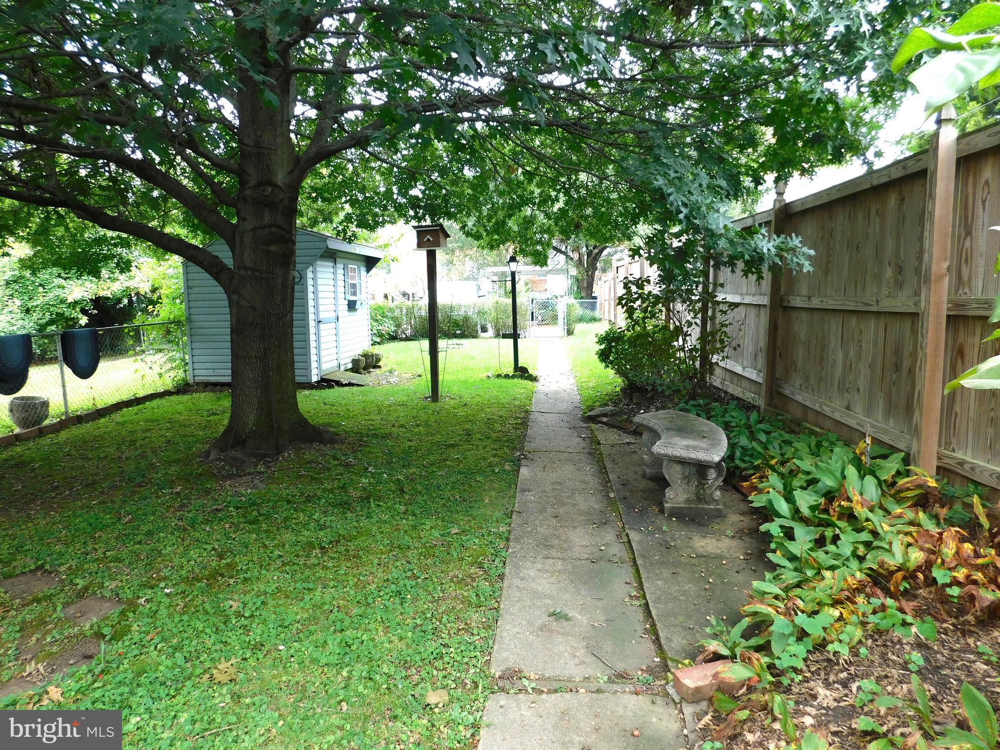 8504 Oakleigh Road Baltimore, MD 21234 - Photo 34 of 35 a view of a backyard with a garden
