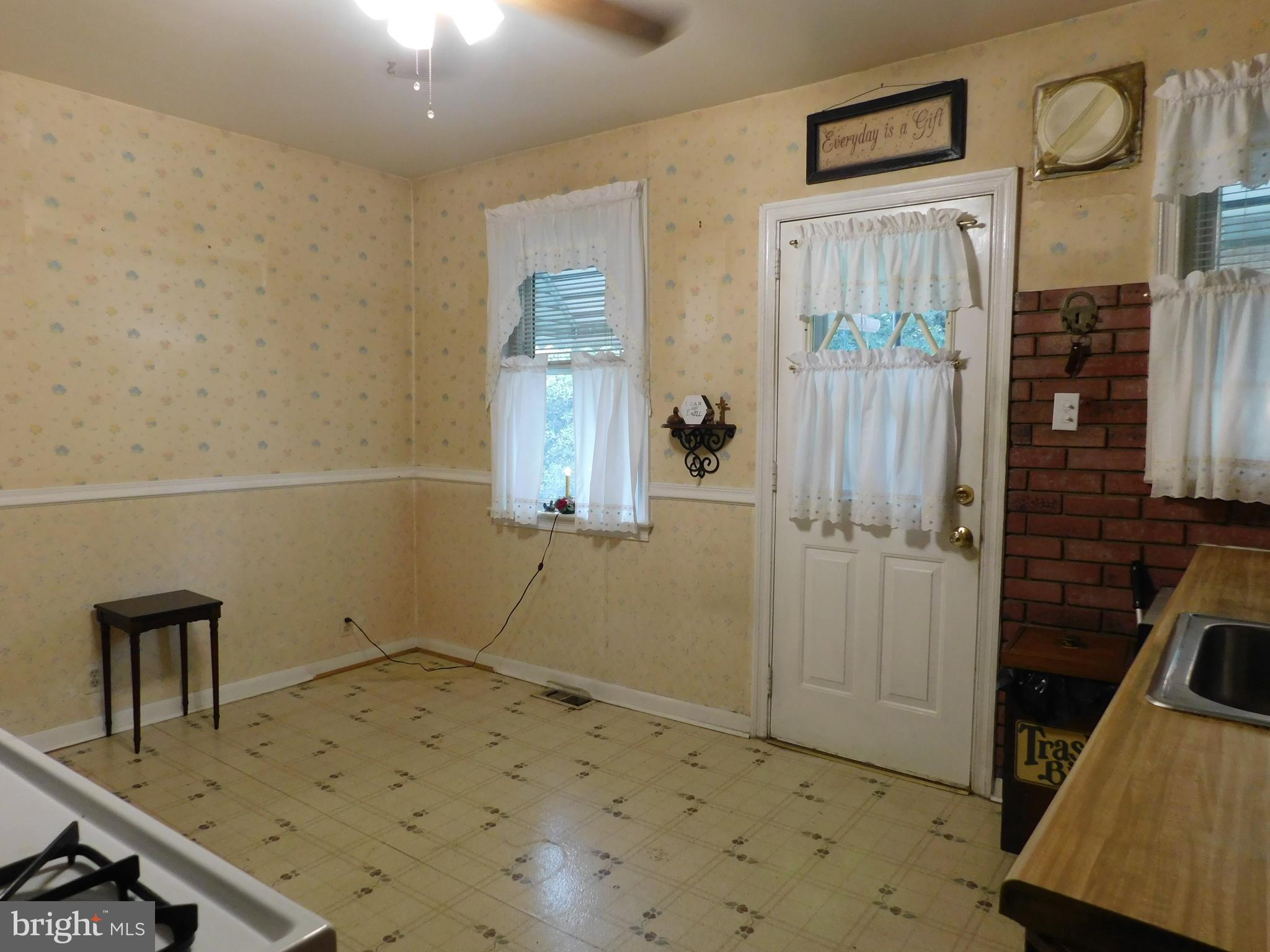 8504 Oakleigh Road Baltimore, MD 21234 - Photo 5 of 35 a view of a storage & utility room with a sink