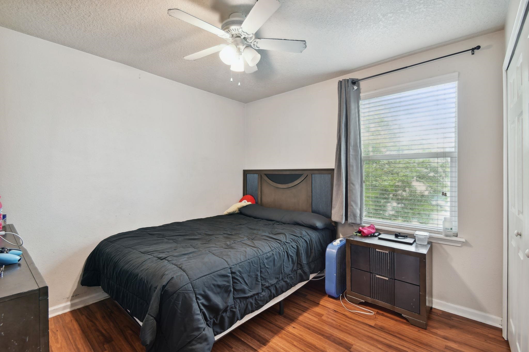 2481 Golden Lake Loop St. Augustine, FL 32084 - Photo 15 of 39 a bedroom with a bed and a window
