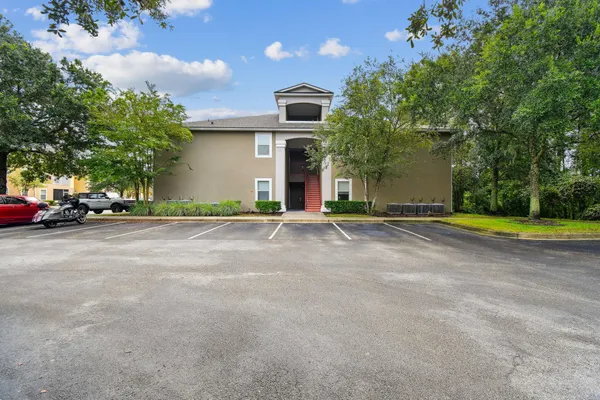 a view of street with parked cars