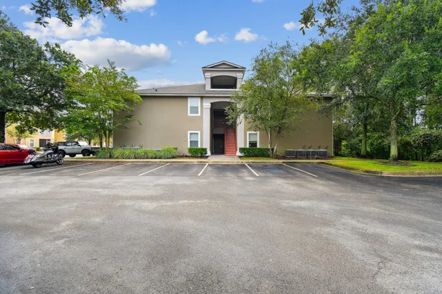 a view of street with parked cars