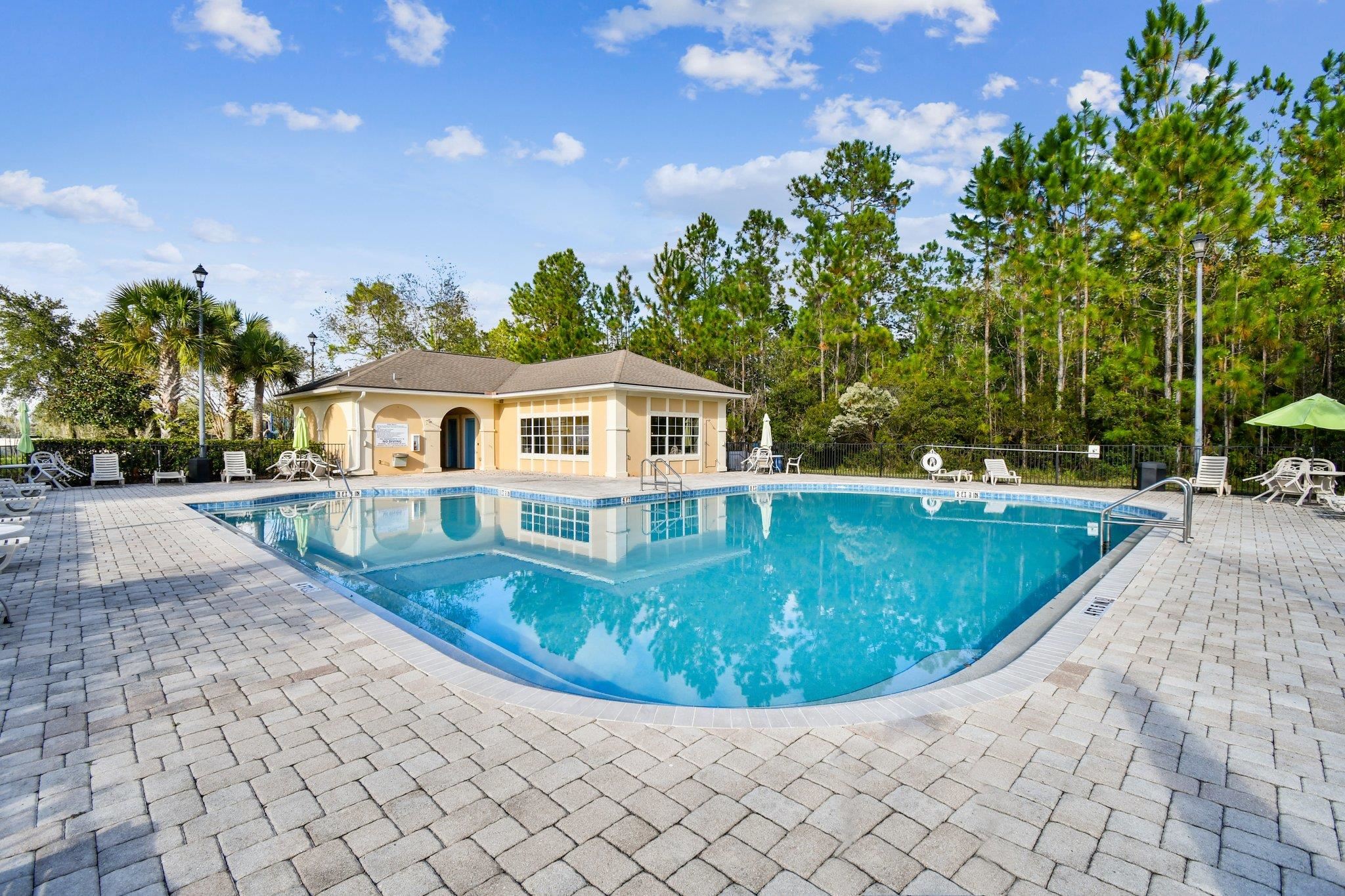 2481 Golden Lake Loop St. Augustine, FL 32084 - Photo 33 of 39 a view of a house with a yard
