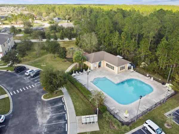 a view of a livingroom with furniture water view and a large window