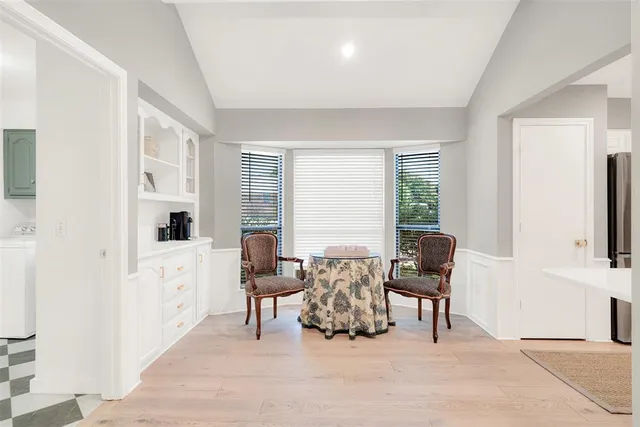 a view of a livingroom with furniture and window