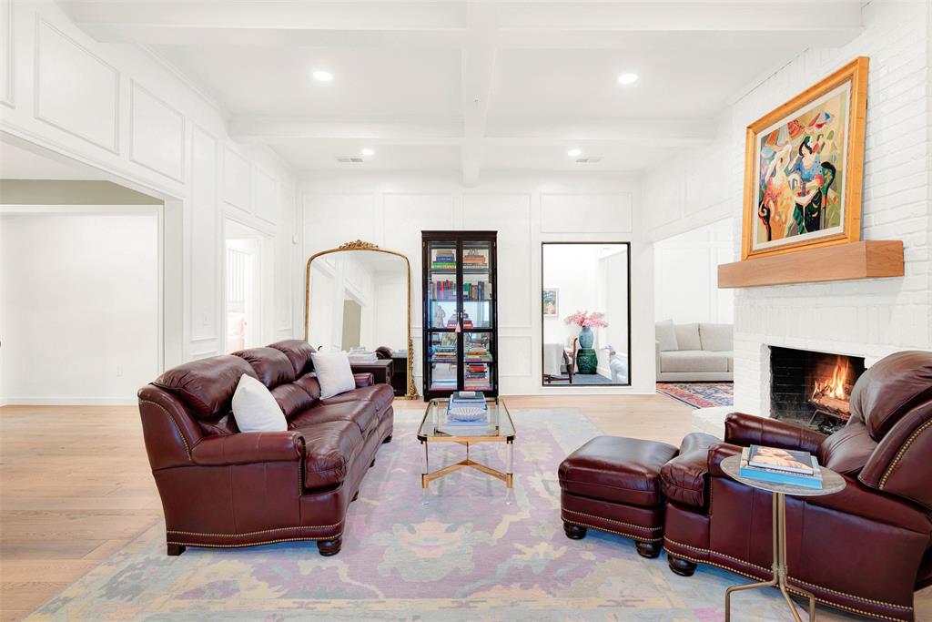 1601 Geneva Lane Plano, TX 75075 - Photo 14 of 38 a living room with furniture fireplace and a large window