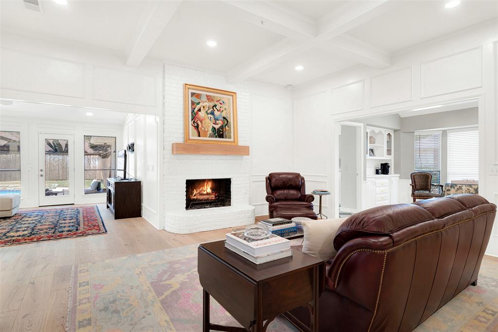 1601 Geneva Lane Plano, TX 75075 - Photo 16 of 38 a living room with furniture and a fireplace