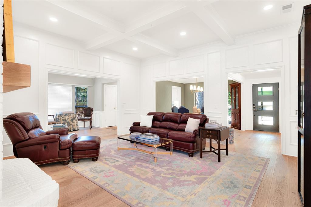 1601 Geneva Lane Plano, TX 75075 - Photo 38 of 38 a living room with furniture and a wooden floor