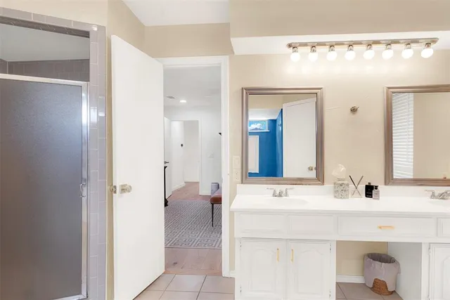 a bathroom with a bathtub and a sink