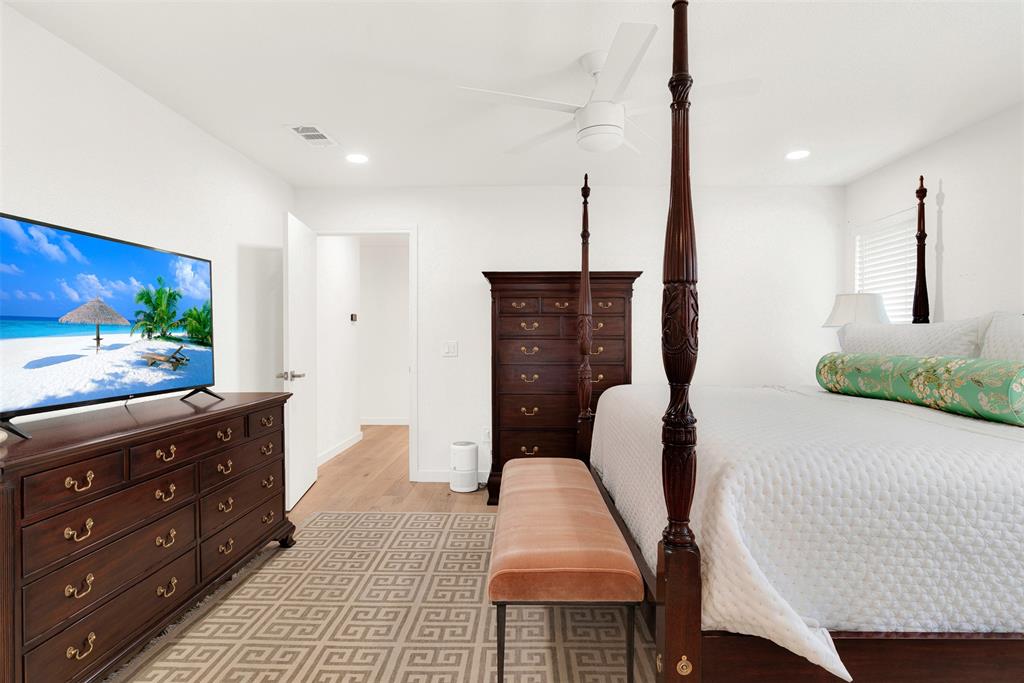 1601 Geneva Lane Plano, TX 75075 - Photo 26 of 38 a living room with furniture and a flat screen tv