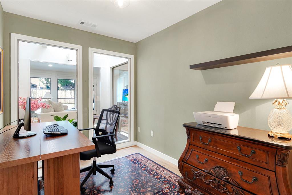 1601 Geneva Lane Plano, TX 75075 - Photo 27 of 38 a room with a window and gym equipment