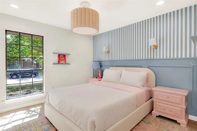 a room with a window and gym equipment