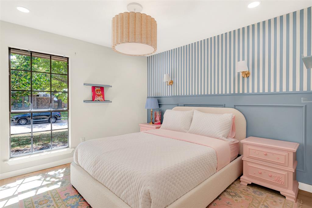 1601 Geneva Lane Plano, TX 75075 - Photo 28 of 38 a bedroom with a bed and a window