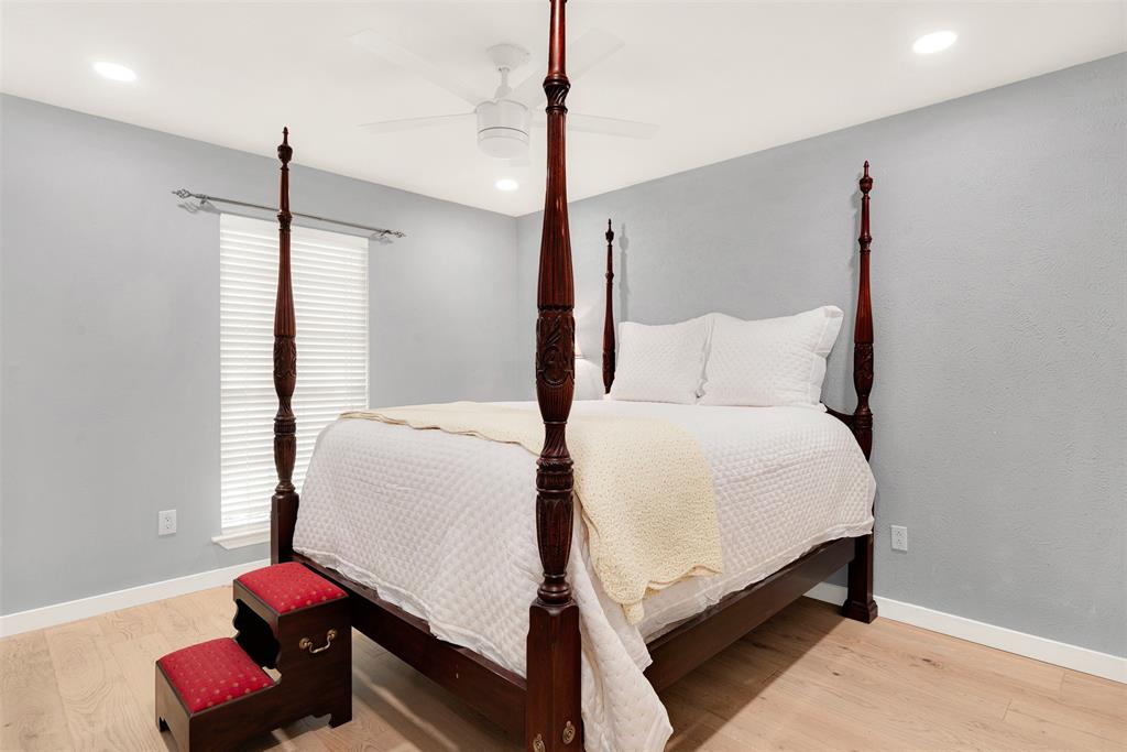 1601 Geneva Lane Plano, TX 75075 - Photo 30 of 38 a bedroom with a bed and window