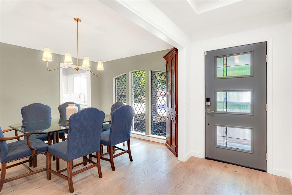 1601 Geneva Lane Plano, TX 75075 - Photo 4 of 38 a view of a livingroom with furniture window and wooden floor