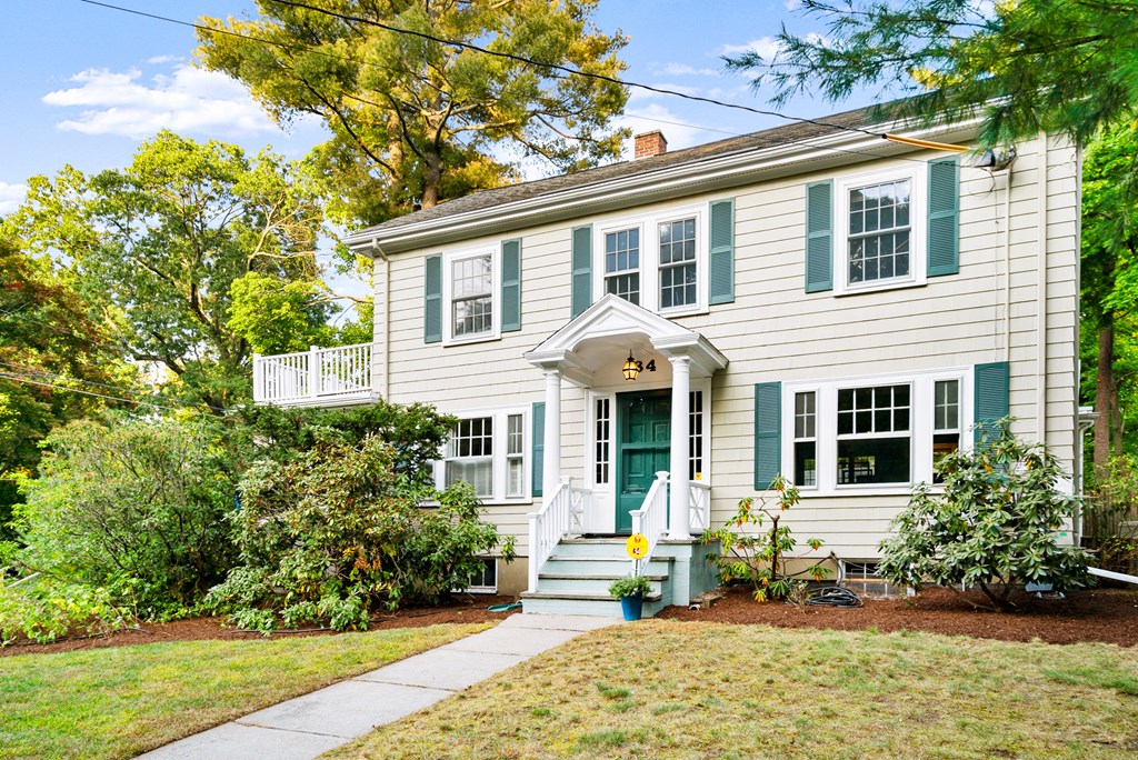 34 Upland Road Newton, MA 02468 - Photo 2 of 33 a front view of a house with garden